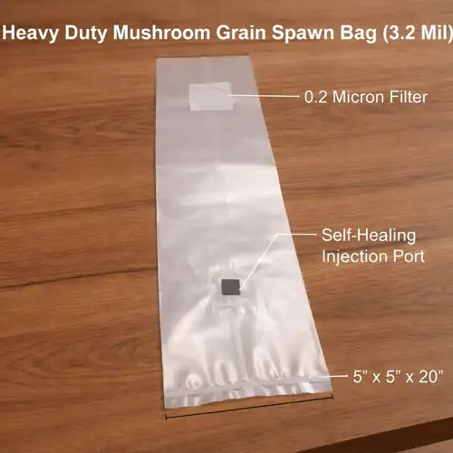 Large 5x20 inch autoclavable spawn bag filled with sterilized grain, showing high capacity for bulk mushroom substrate production.